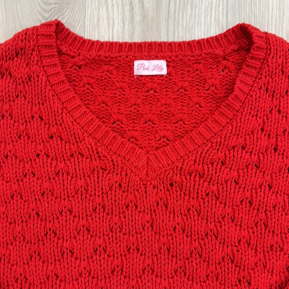 Red sweater. - Picture 3 of 3